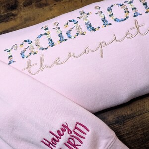 Radiation Therapist Floral Embroidered Sweatshirt, Personalized Sleeve, RT Flower Sweatshirt, Embroidery, Gifts for Her, RT Presents Light Pink