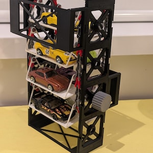 Garaje giratorio modular para coches a escala 1/64