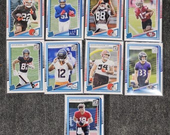 Lote de 9 tarjetas de fútbol americano Donruss 2025, clasificado como novato: Carter Loop Fannin Jr.