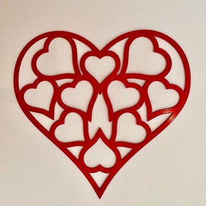 Cuori dentro un cuore, decorazione murale