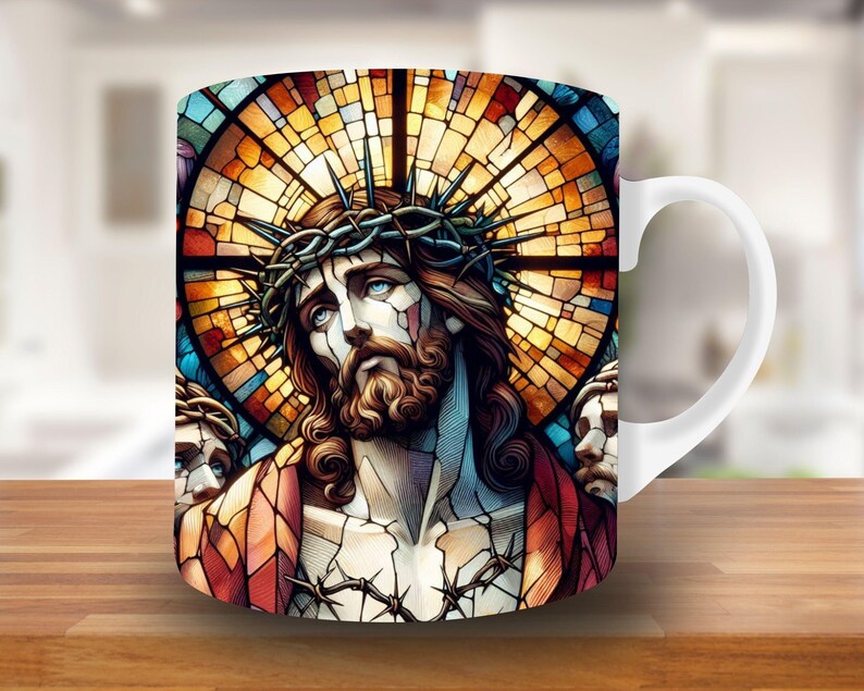 May include: White ceramic mug with a stained glass design featuring a depiction of Jesus Christ with a crown of thorns. The stained glass design is in shades of red, yellow, blue, and green.