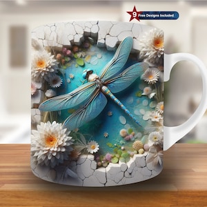 May include: White ceramic mug with a colorful dragonfly and flowers design. The dragonfly is blue and green with a white background. The flowers are white and pink. The mug has a handle on the right side.