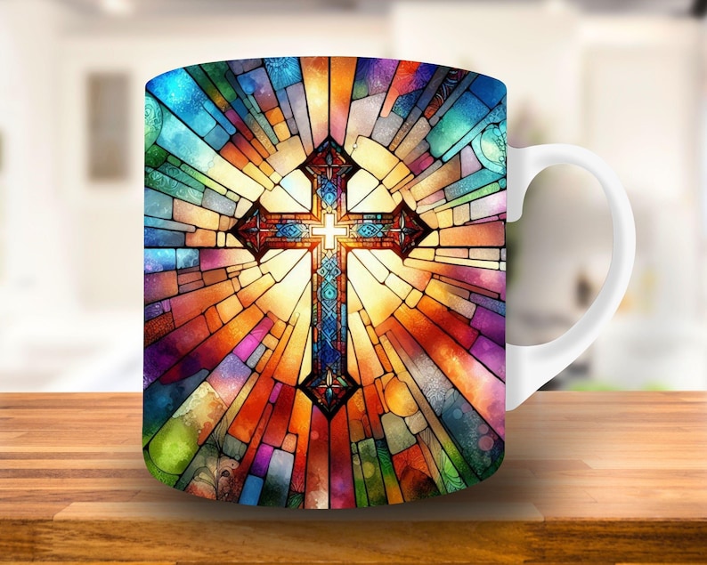 May include: White ceramic mug with a colorful stained glass design featuring a cross. The design is reminiscent of a church window.