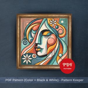 May include: A framed cross-stitch pattern featuring an abstract face with closed eyes. The artwork uses a palette of teal, orange, pink, and yellow. The text "PDF Pattern (Color + Black & White) - Pattern Keeper" is at the bottom.