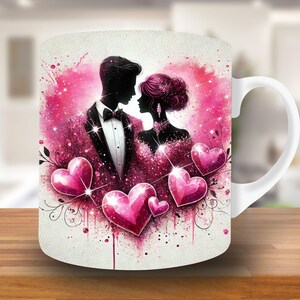 May include: White ceramic mug with a pink watercolor design featuring a silhouette of a couple in love. The design includes hearts and floral accents.
