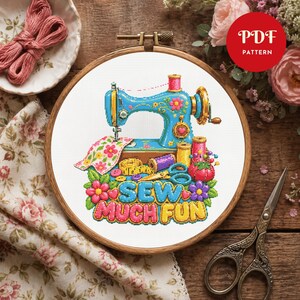 May include: A cross stitch pattern featuring a blue sewing machine, a yellow measuring tape, a purple spool of thread, a red pincushion, and floral fabric. The text SEW MUCH FUN is displayed in large, colourful, block-style letters at the bottom.