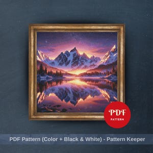 May include: A framed landscape art print featuring a mountain range reflected in a lake at sunset. The artwork has a gold-colored frame and a vibrant color palette of purple, orange, and white. The text "PDF PATTERN" is on the bottom right.