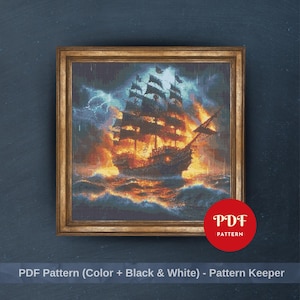 May include: Framed cross-stitch pattern of a burning pirate ship at sea, under a stormy sky with lightning. The artwork is in a gold-coloured frame. The image includes a red circle with the text "PDF PATTERN".