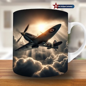 May include: A white ceramic mug with a handle features a colorful image of a vintage airplane flying through the clouds. The airplane is a dark blue and gray color with red, white, and blue markings. The clouds are white and gray, and the background is a bright blue sky.