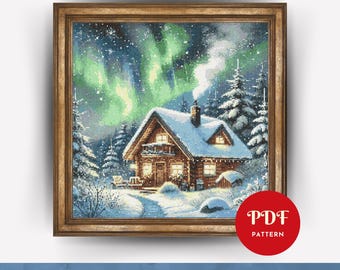 May include: A cross-stitch pattern featuring a cozy cabin in a snowy forest with a vibrant green aurora borealis in the night sky. The cabin has a warm glow from the windows and a chimney with smoke rising from it. The pattern is framed in a brown wooden frame.