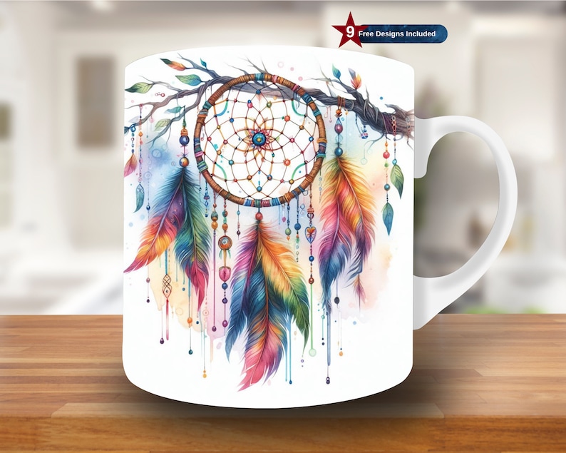 May include: White ceramic mug with a colorful dreamcatcher design. The dreamcatcher features feathers, beads, and a web-like pattern. The background is a watercolor wash of blue, pink, and yellow.