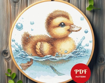 アヒルの子のクロスステッチパターン、傘を持ったアヒルの刺繍の絵を