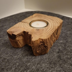 Candle holder, tea light holder