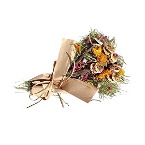 May include: A bouquet of dried flowers and grasses wrapped in brown paper. The arrangement includes yellow, orange, and red flowers, with green foliage and twigs. The bouquet is tied with a natural twine bow.