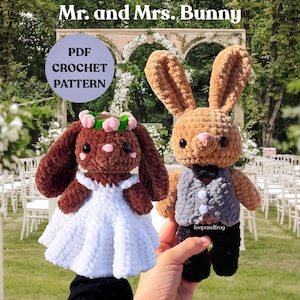 May include: Two crocheted bunny dolls, one in a white dress and floral crown, the other in a gray vest and black pants. The image includes the text "Mr. and Mrs. Bunny" and "PDF Crochet Pattern".