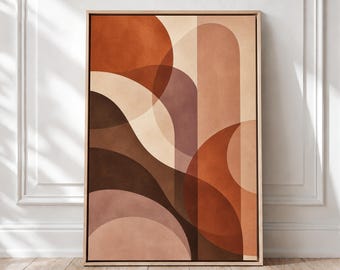 May include: A rectangular framed wall art piece featuring an abstract composition of overlapping geometric shapes in shades of terracotta, deep brown, beige, and muted mauve, enclosed within a light-colored wooden frame.