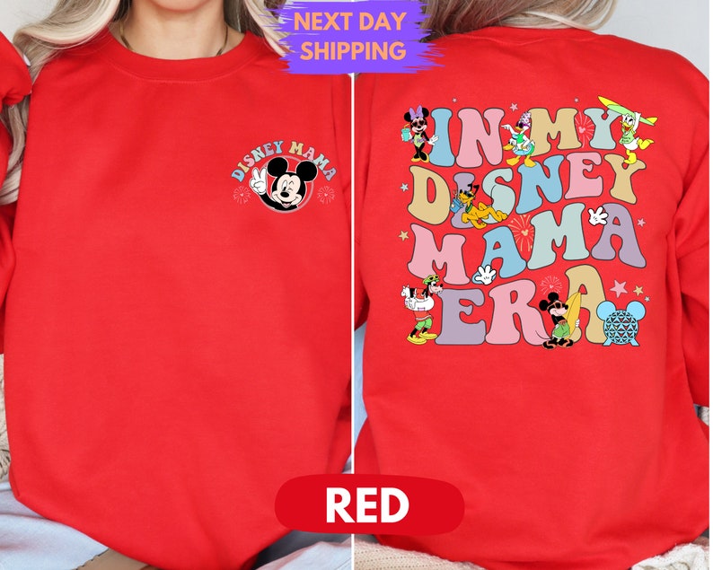May include: Red sweatshirt with a Mickey Mouse graphic on the front and the text "In My Disney Mama Era" with various Disney characters on the back.