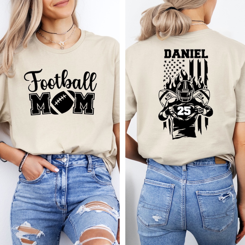 May include: A beige t-shirt with the text "Football Mom" and a football graphic on the front. The back of the shirt features a black and white illustration of a football player with the text "DANIEL" and an American flag.
