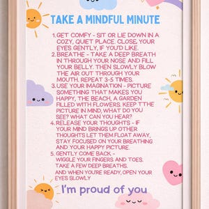 May include: A framed print with the text "Take a Mindful Minute" and instructions for mindfulness. The design includes cartoon suns, clouds, rainbows, and hearts. The phrase "I'm proud of you" is at the bottom.