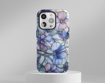 May include: A phone case with a floral pattern of blue, purple, and white flowers. The case has a glossy finish and a protective design. The flowers are stylized with a stained glass effect.