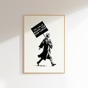 May include: Black and white illustration of a judge walking and holding a sign that reads "THE LAW IS REASON, FREE FROM PASSION".