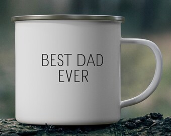 May include: White enamel mug with a silver rim and handle. The mug features the text "BEST DAD EVER" in black, centered on the front. The mug is designed for hot beverages.