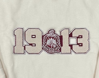 Tripulación Delta con Chenille de 1913