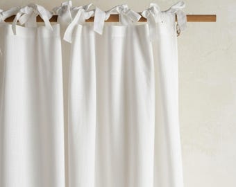 Cortina de linho branca estilo boho com amarração superior, feita sob medida para portas e janelas, ideal para decoração de interiores.