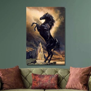May include: A black horse rearing up on its hind legs against a dramatic, stormy sky backdrop. The horse is silhouetted against a bright, golden light.