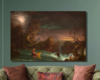 May include: A painting depicting a stormy seascape with a lone figure in a small boat navigating through rough waters. The scene is dominated by dark, dramatic clouds and rocky cliffs. The painting is framed and displayed on a wall in a living room setting.