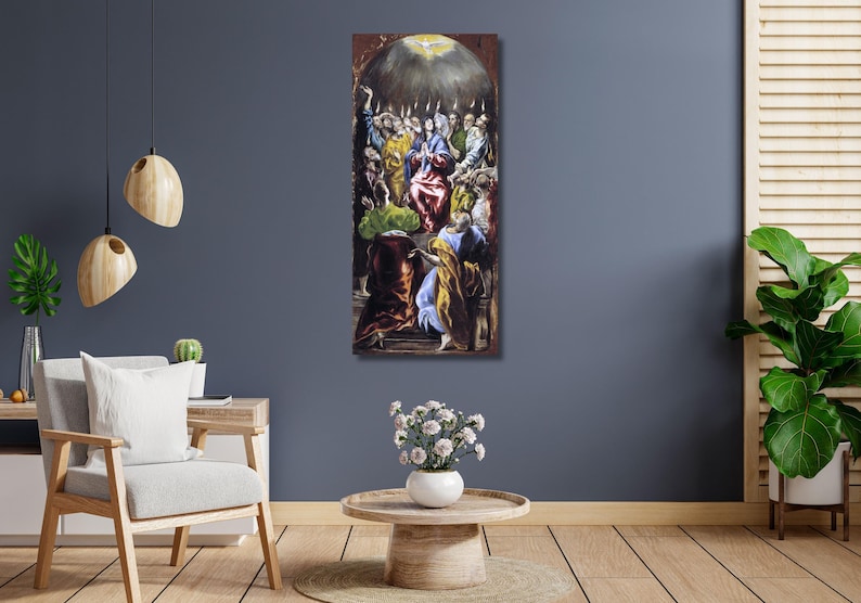 May include: A vertical framed painting depicting a religious scene with multiple figures in colorful robes. The artwork features a central figure surrounded by others, with a bright light emanating from above. The painting is displayed on a dark blue wall.