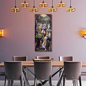 May include: A dining room featuring a wooden table with eight chairs, a painting, and several hanging pendant lights. The painting depicts a religious scene with figures in various colors. Wall sconces provide additional lighting.
