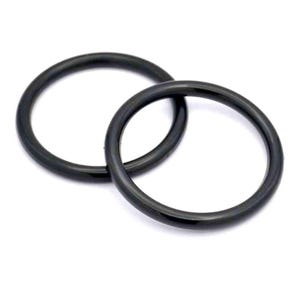 May include: Two black plastic rings, each with a smooth, rounded surface. The rings are interlocked, creating a circular shape.