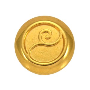 May include: A round button in gold with a raised, stylised swirl design.