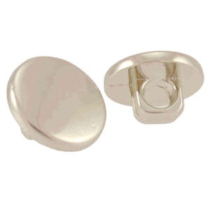 May include: Two silver buttons with a rounded, slightly domed top and a loop on the back for sewing. The buttons have a smooth, reflective surface, suitable for clothing or fabric items.