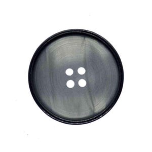 May include: A large, circular button with a dark grey, subtly shimmering surface. It features a black rim and four white holes at the centre for stitching. Suitable for various sewing projects.