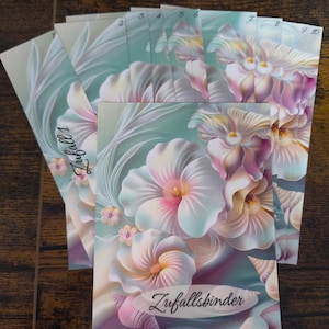 Könnte beinhalten: Ein Stapel von zehn Karten mit einem Blumendesign. Die Karten zeigen weiße und rosa Blüten, Muscheln und den Text "Zufallsbinder". Der Hintergrund ist helltürkis mit Aquarelleffekt. Jede Karte ist von 1 bis 10 nummeriert.