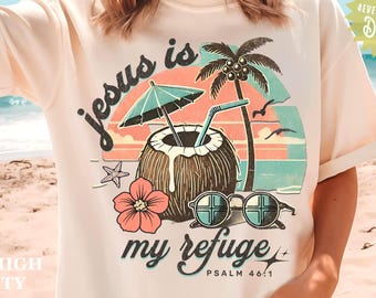 Puede incluir: Una camiseta color crema con un gráfico de una bebida de coco con pajita y sombrilla, una palmera, una flor de hibisco, gafas de sol y una estrella de mar. El texto dice: Jesus is my refuge PSALM 46:1.