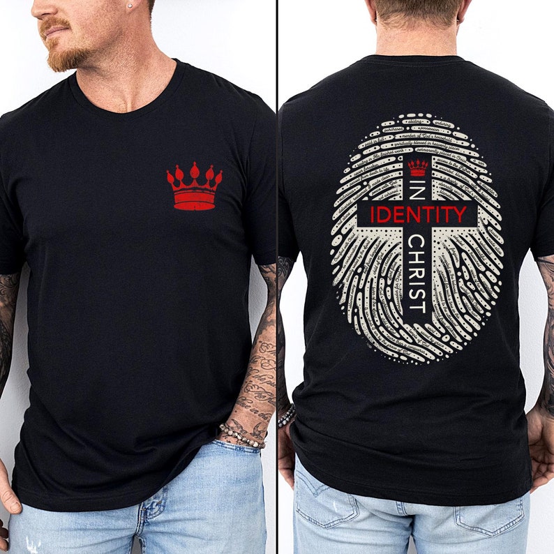May include: Black t-shirt with a red crown on the left chest and a fingerprint design on the back with a cross and the text "IN CHRIST IDENTITY".
