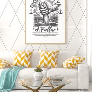 May include: A framed print with the words "DIOS NO TE VA A Fallar" and a graphic of a hand reaching from the water. The print is above a white sofa with yellow and white chevron pillows and a glass coffee table.