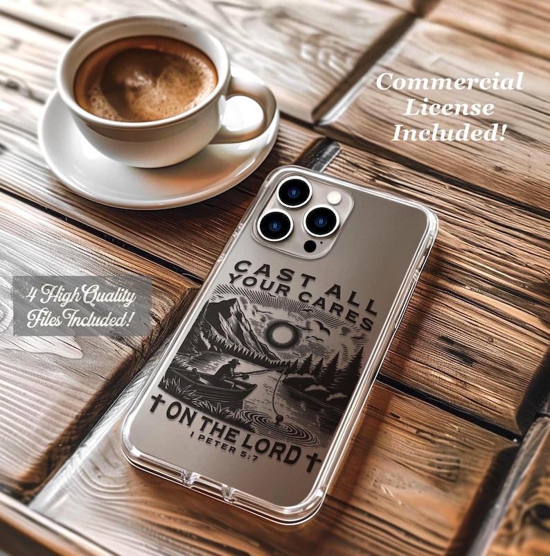 May include: A clear phone case with a black graphic of a fisherman on a lake, mountains, and the text "CAST ALL YOUR CARES ON THE LORD" and "I PETER 5:7". A cup of coffee sits on a saucer in the background.
