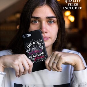 May include: A black phone case with a white design that says "The King of Kings and Lord of Lords Jesus" with a crown and cross. The text "1 Timothy 6:15" is also included.