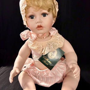 Geppeddo Collector Series &quot;Baby Kelsey&quot; 14&quot; Porcelain Baby Doll. 891 of 1,575.