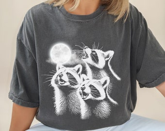 Camicia di procioni che ulula comfort colori, camicia di procione bootleg, camicia di procione divertente, regalo umoristico, camicia di luna celeste, camicia oversize