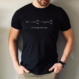 May include: A black t-shirt with a white graphic of a rocket science equation and the text "It's literally rocket science."