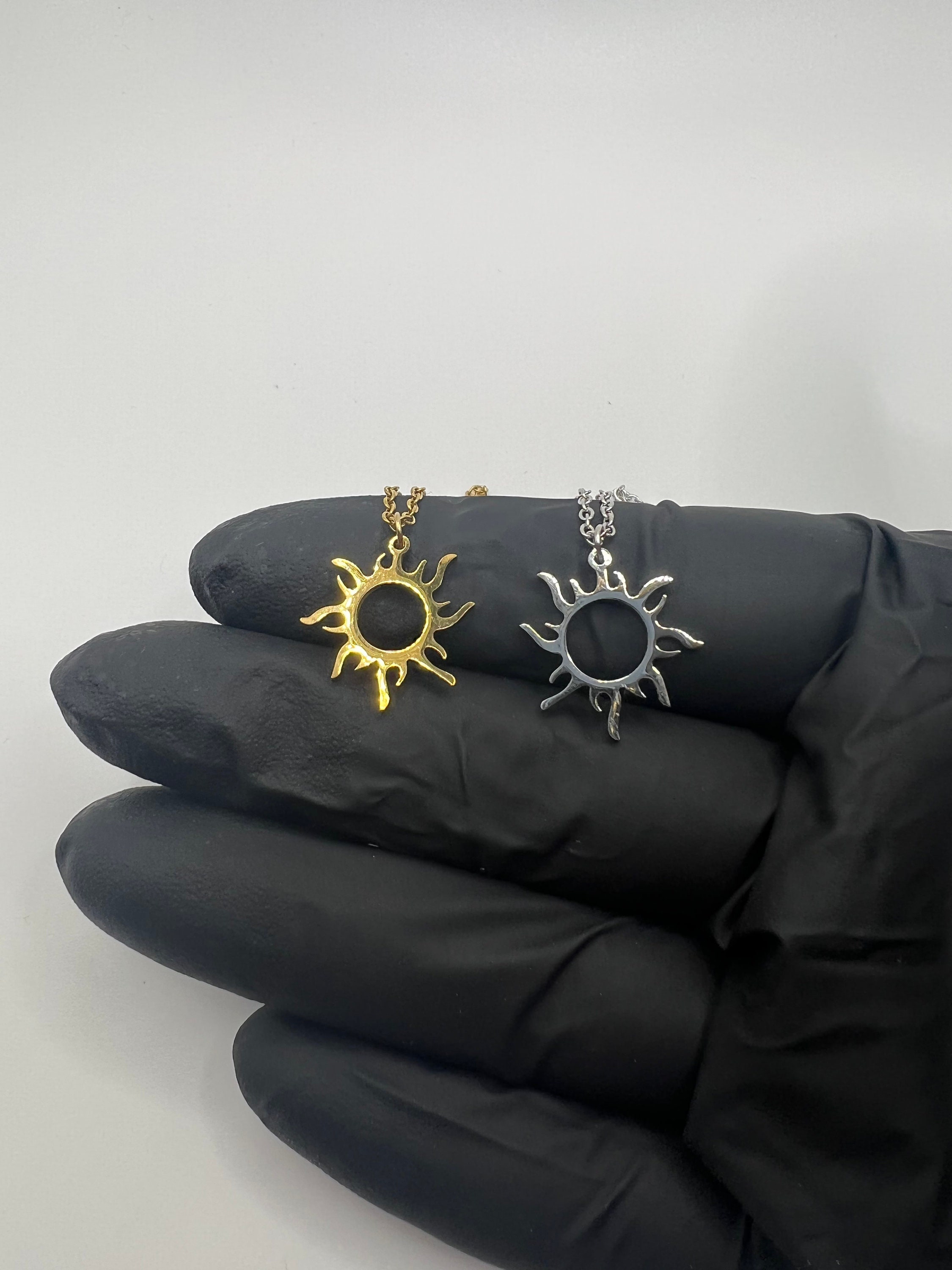 Rapunzel sun necklace deals