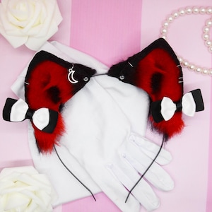 Diadema con orejas de gatito y rosa a la luz de la luna