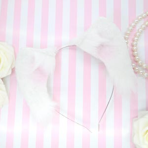 Diadema clásica con orejas de gatito blancas