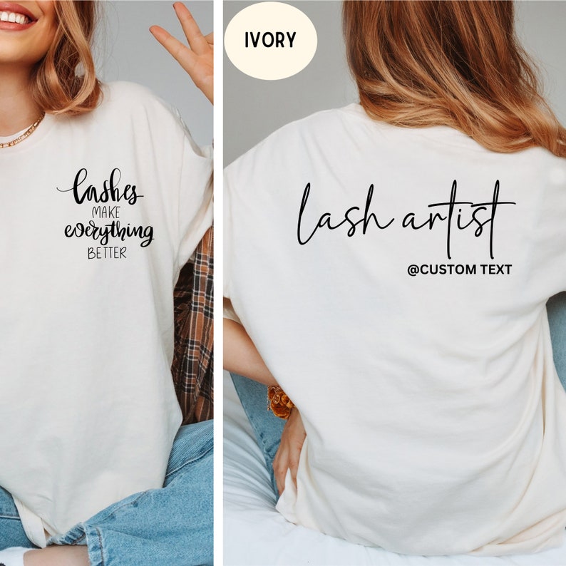 May include: Ivory-colored t-shirt with the text "lashes make everything BETTER" on the front. The back of the shirt says "lash artist" with "@CUSTOM TEXT" below. The shirt is a casual, everyday wear item.