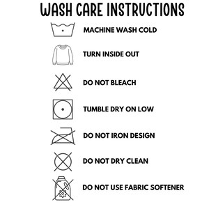 May include: White graphic with black text and laundry care symbols. Instructions include machine wash cold, turn inside out, do not bleach, tumble dry on low, do not iron design, do not dry clean, and do not use fabric softener.